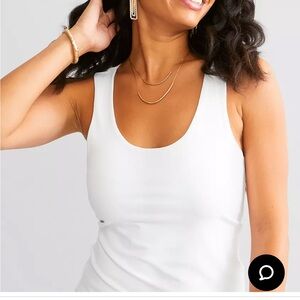Buckle smoothing and shaping winter white tank